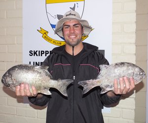 Johan Lesch spog hier met sy en Oubaas se vis. 